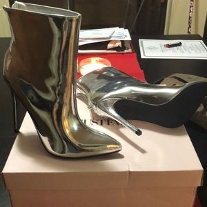 Metallic silver boots